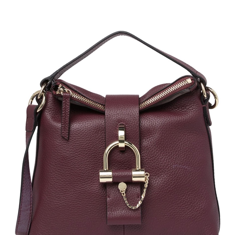 Vince Camuto Javi Crossbody Bag in a rich reddish brown color Bitten.